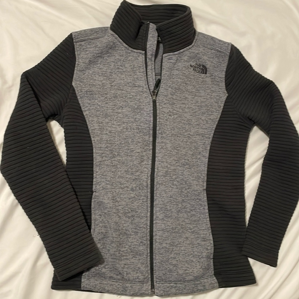 North face zip up jacket.